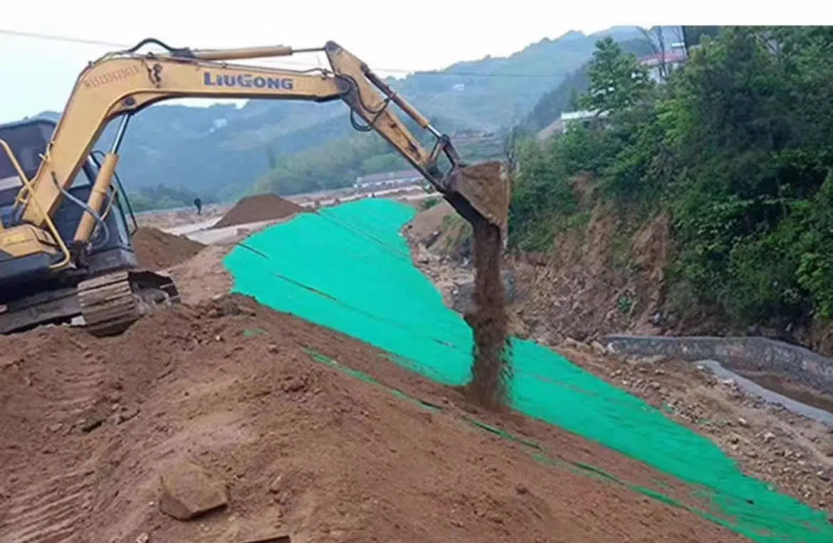 Geotextile fabric placed across an earthwork surface
